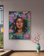 Colorful painting of a woman's face with flowers on a wall in a room with a vase and branches.