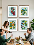 People enjoying a meal together with colorful Luna Burlo fruit paintings on the wall.