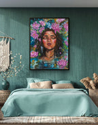 Bedroom with teal walls, a bed with blue bedding, and a colorful painting of a woman with flowers above the bed. July birth flowers painting