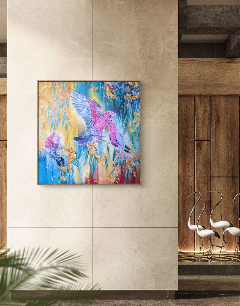 "Blush in the Branches", a bold, colorful abstract mixed media textured painting or fine art print of three native australian pink galahs on a wall in a modern interior setting. Large feature or statement piece painted by Melbourne, Australia artist, Luna Burlo 