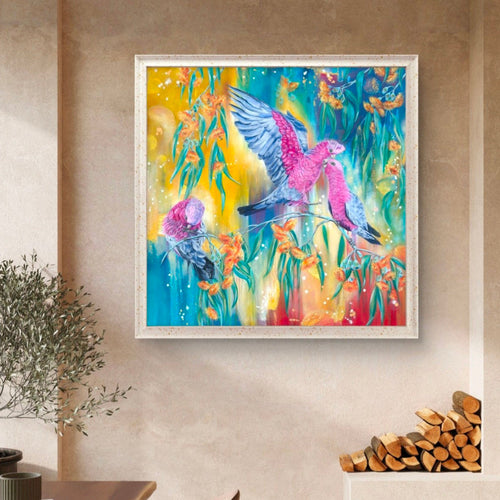 Framed colorful abstract painting or fine art print of native Australian galah birds and eucalyptus flowers on a wall with modern neural decor elements. Artwork by Luna Burlo, made in Melbourne, Australia