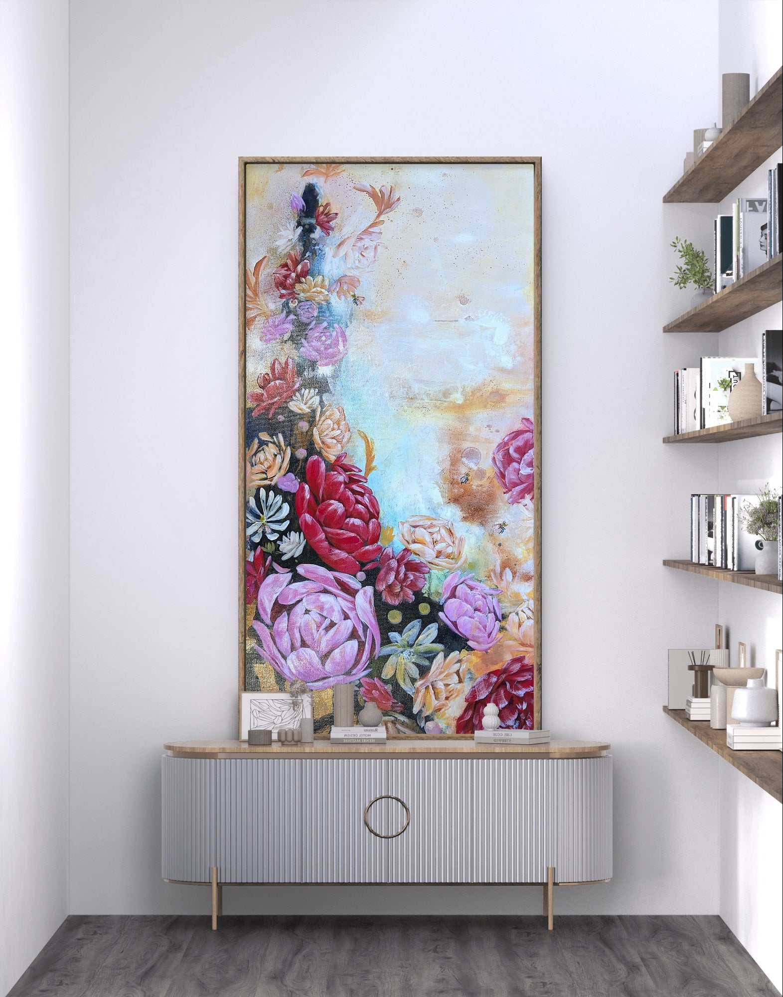Floral Luna Burlo artwork on a knook wall above a cabinet in a room with shelves. Design idea