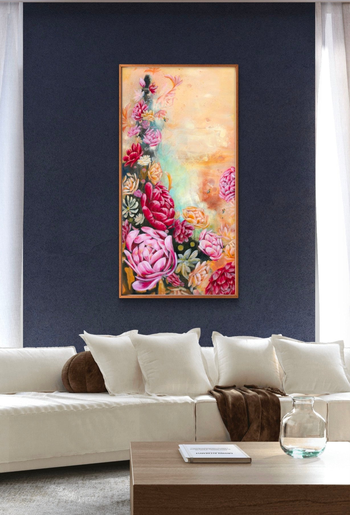 Abstract floral painting on a wall above a sofa in a modern living room or hotel waiting area. Red and pink peony flowers, with native Australian flowers and insects. Artwork by Luna Burlo, Melbourne, Australia