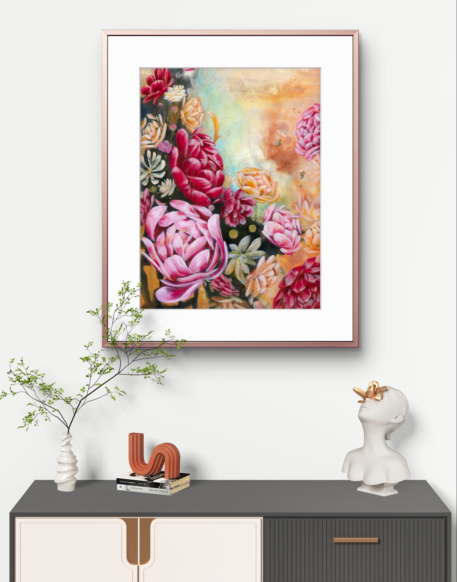 Framed red and pink peony floral fine art canvas print with black and neutral background painting on a wall above a console hallway table with decorative items. Painting also features Native Australian flowers and blue banded bees. Art by Luna Burlo, Melbourne, Australia
