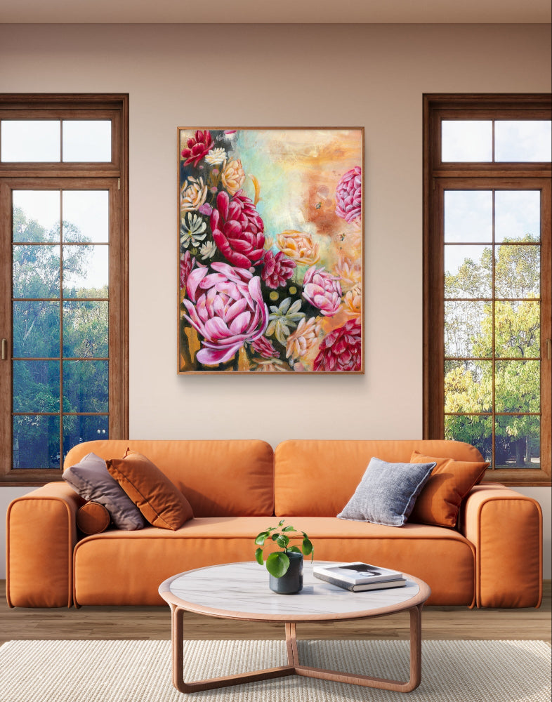Living room with an orange sofa, coffee table, and large red, pink, neutral, black floral painting on the wall. Art by Luna Burlo, Melbourne, Australia