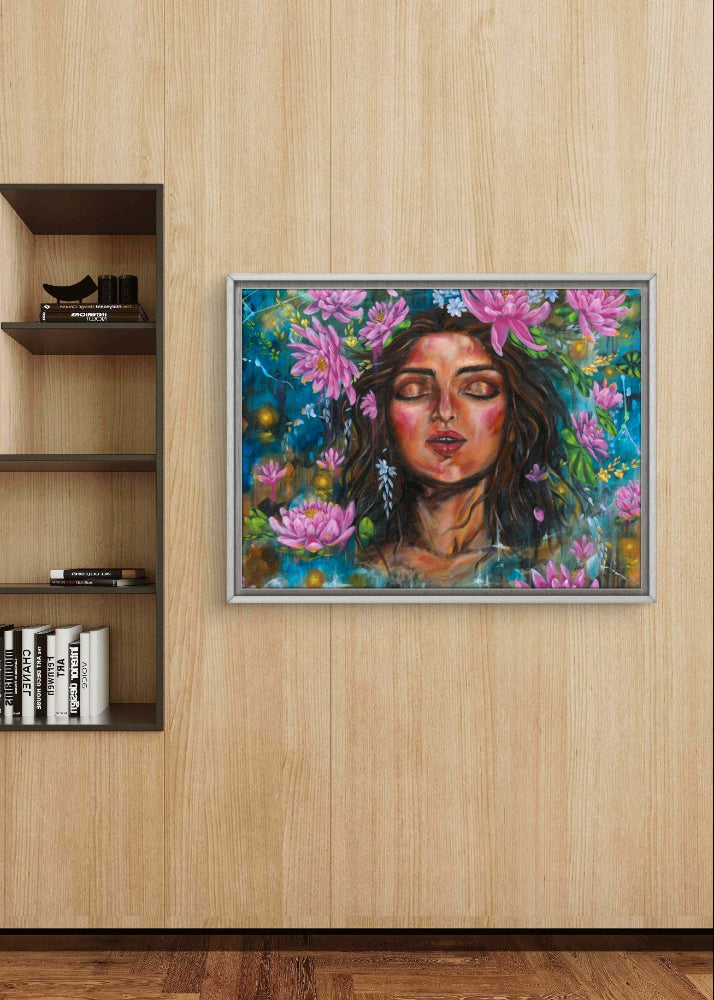 Large rectangle framed fine art canvas print artwork of a woman with pink lotus flowers on a blue background wooden wall. Artist: Luna Burlo, Melbourne, Australia
