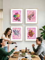 friends sitting at a dining table with wine glasses, surrounded by framed Luna Burlo food on the dining room wall.

Framed Luna Burlo fine art paper print or her original artworks of capsicums, olives, sage, and tomatoes from series "Mediterranean Table".

Colorful abstract with reds, purples, greens on a fun and textured maximalist pink background. Rectangle portrait or vertical orientation. Made in Melbourne, Australia