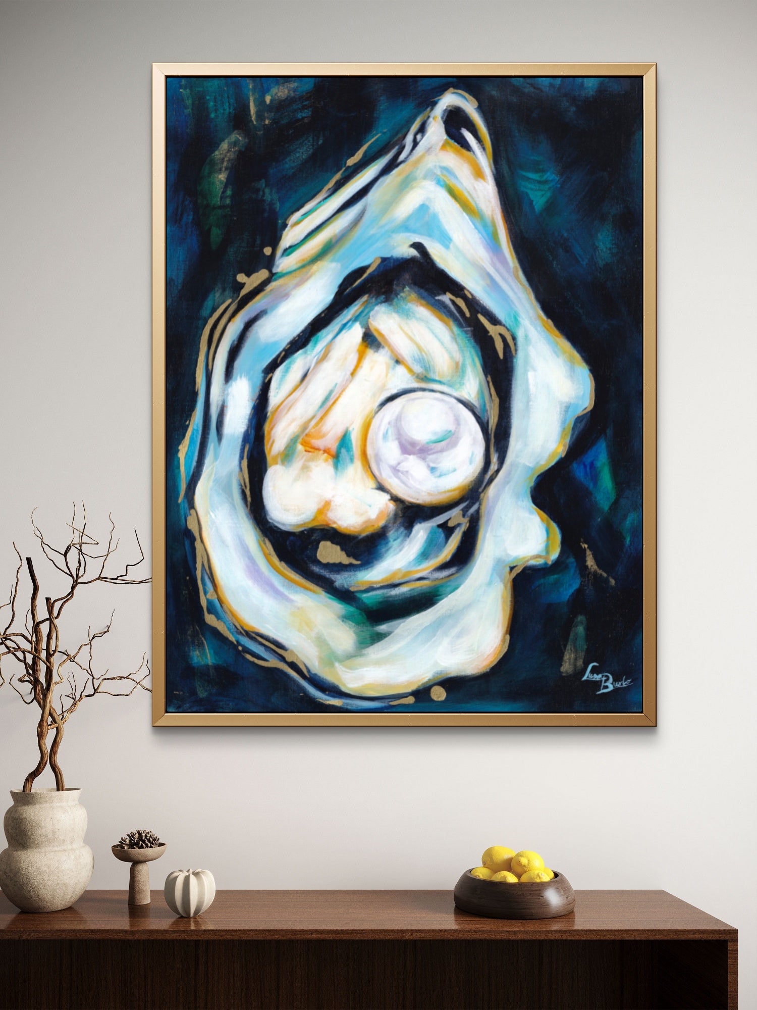 Framed Luna Burlo abstract food art painting of an oyster with a pearl on a wall above a wooden living room or dining room console table.

Framed Luna Burlo fine art paper print or her original artwork of Oyster from series "Mediterranean Table".

Colorful abstract food art with white pearland gold accents on a drak blue and green background. Rectangle vertical or portrait orientation. Made in Melbourne, Australia