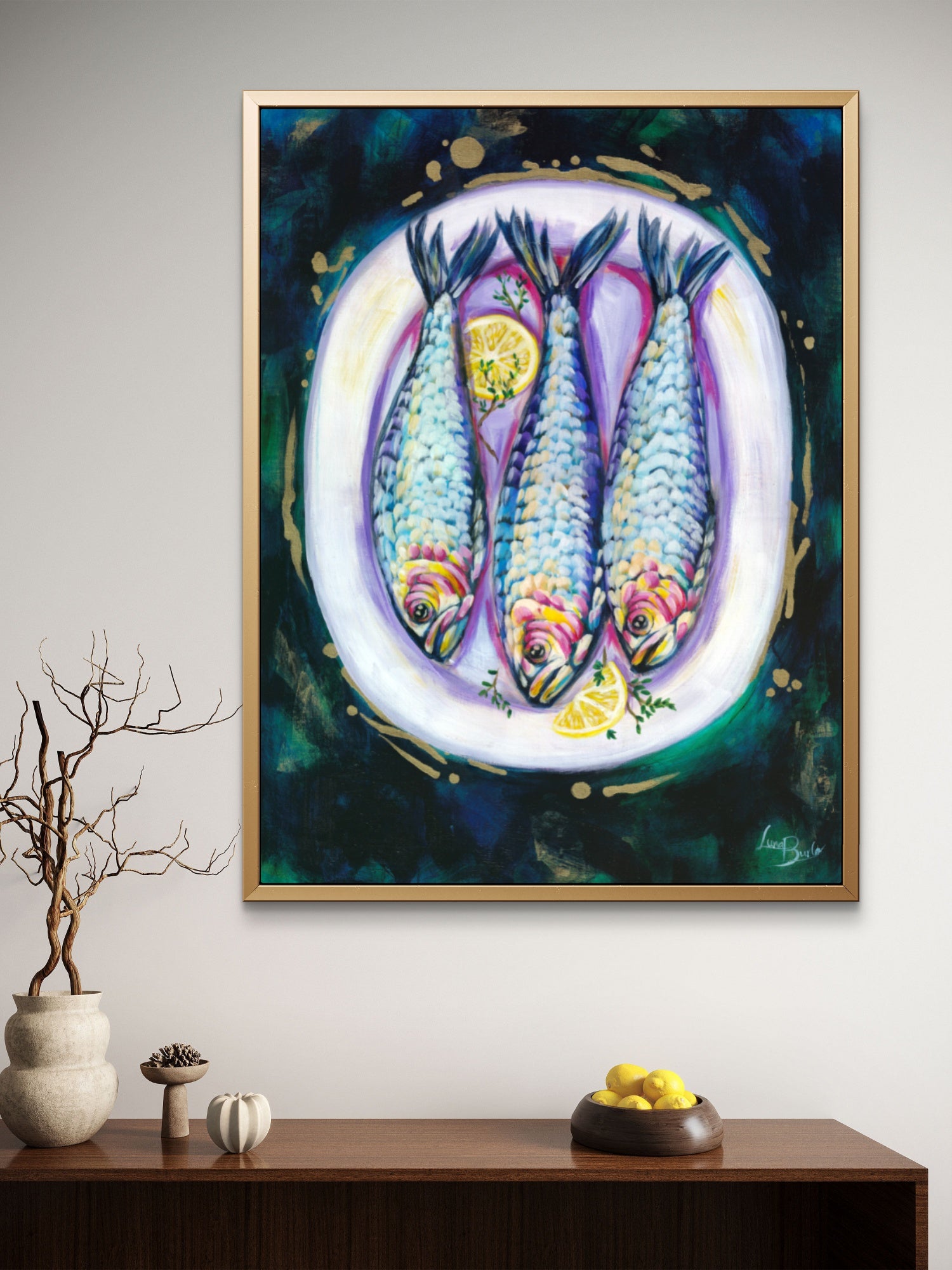 Fine art paper print or her original artwork of "Sardines" from series "Mediterranean Table". Framed image appears against a white living or dining room wall above a console table.

Colorful abstract food art with white, purple, and gold accents on a dark blue and green background. Rectangle vertical or portrait orientation. Made in Melbourne, Australia