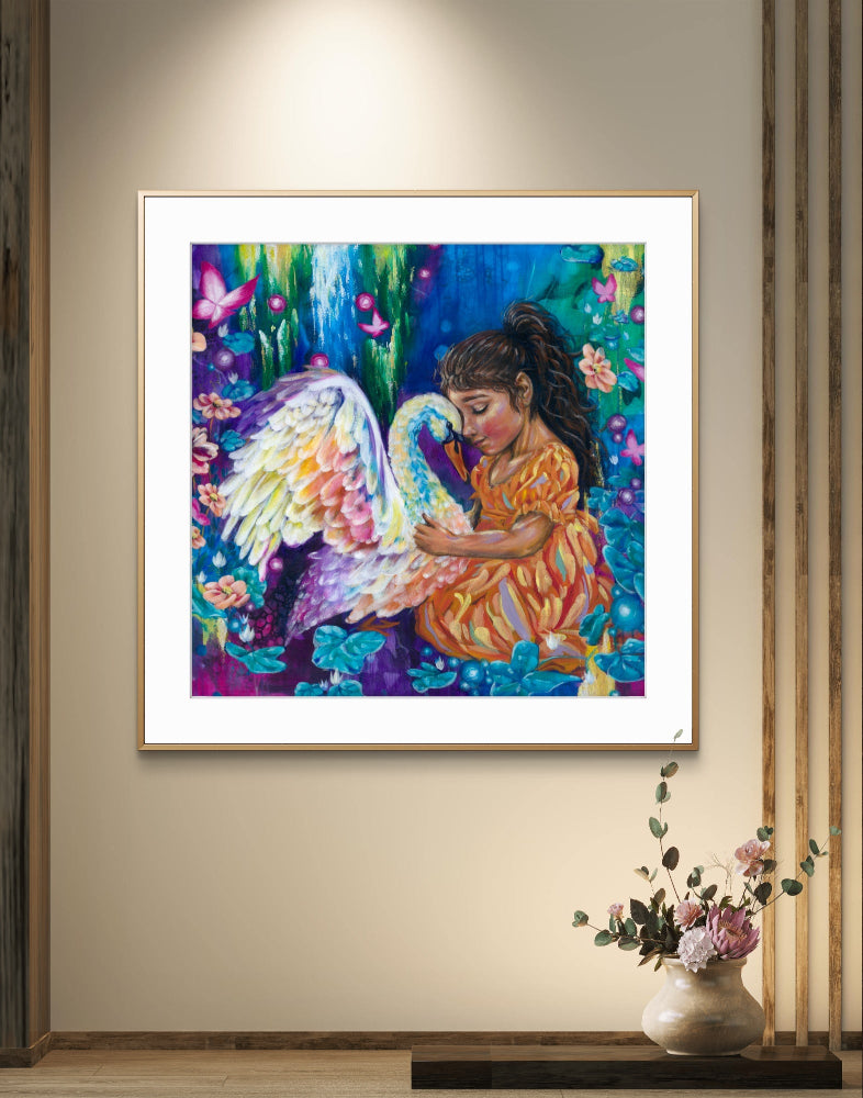 Square framed blue and orange colorful painting/ fine art canvas print of a girl with a swan on a beige neutral living room wall. Art by Luna Burlo, Melbourne, Australia
