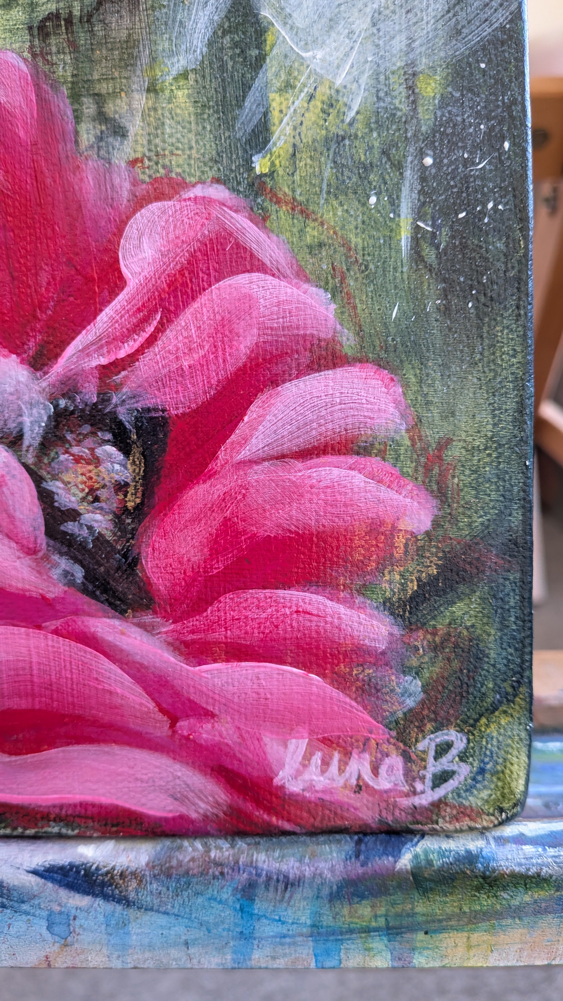 Signature close up of colorful Luna Burlo abstract floral painting with pink and red Native Australian tea tree flowers and a white flower in the center, with green and gold background. Made in Melbourne, Australia