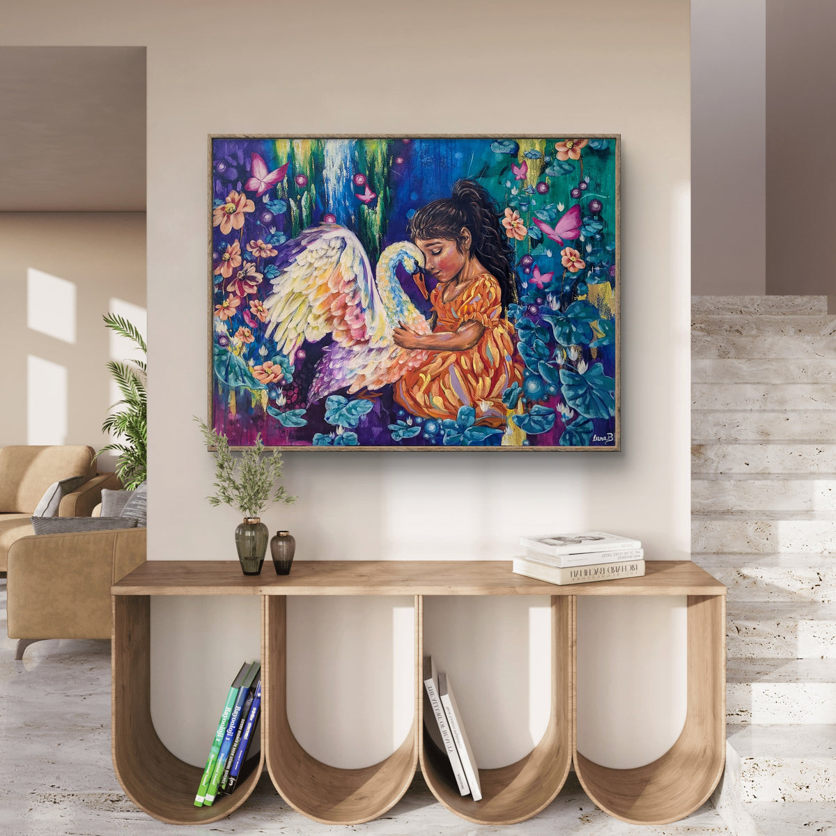 Large maximalist colorful Luna Burlo painting or fine art print of a girl with a swan on a wall above a wooden console table.
