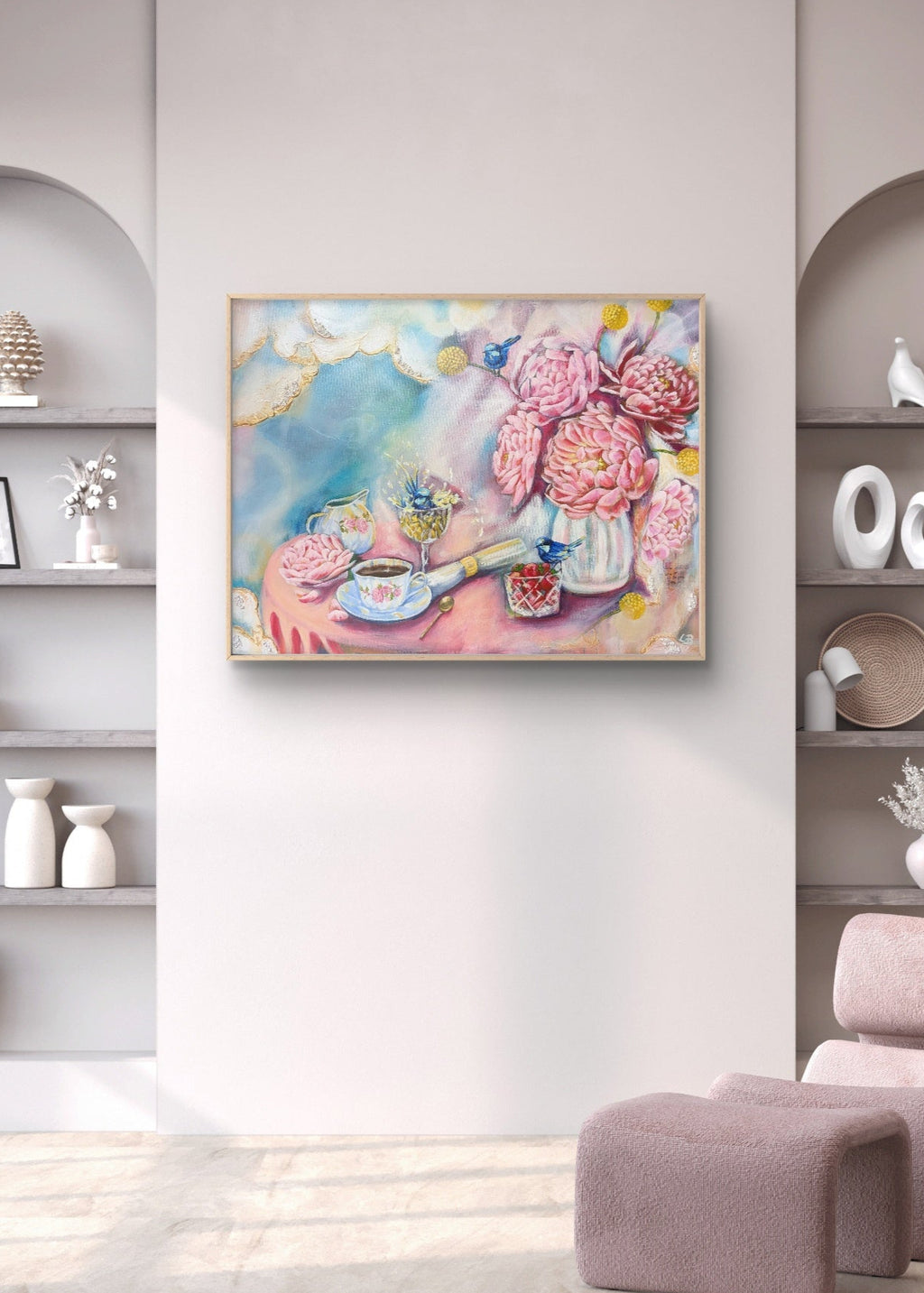 Large framed mixed media painting or framed fine art print of pink peony flowers, fairy wrens, and a teacup on a wall in a room with shelves and a chair. By artist Luna Burlo, Melbourne, Australia